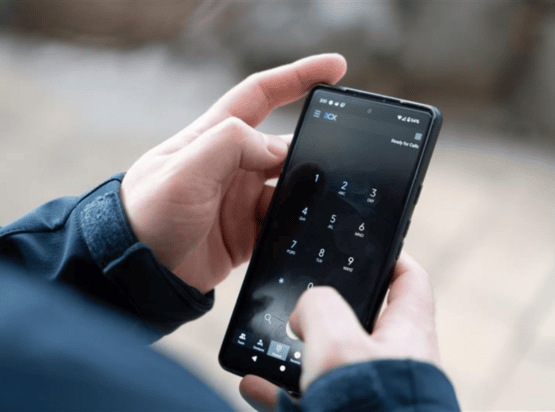 Person using Microsoft 365 app on smartphone for productivity.